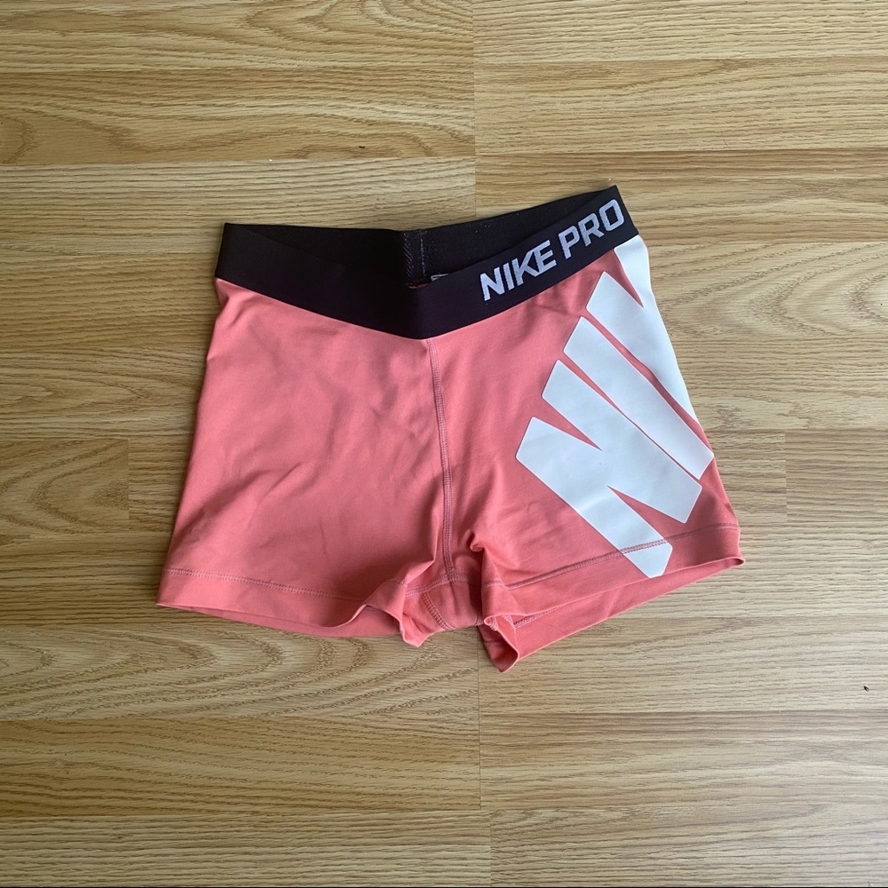 Medium Coral Nike Pros